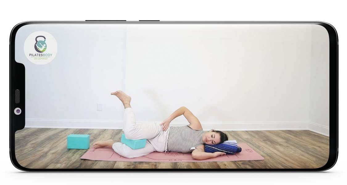 Prenatal-Yoga-for-Sciatica-Pain-Class-PILATESBODY-on-demand-app-by-kayla-online-pilates-workout