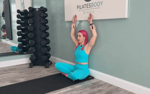How to so wall shoulder slide exercise demonstration from the 28 day wall pilates challenge