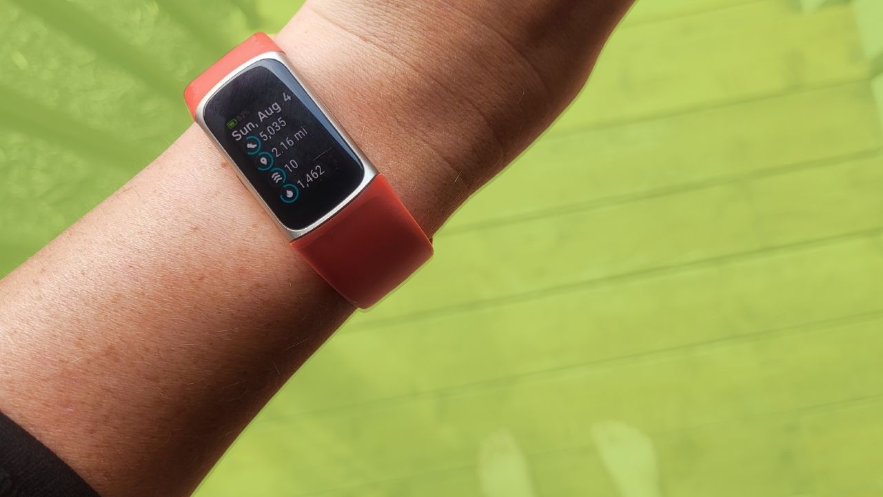 Womans arm showing Fitbit with Activity Tracking