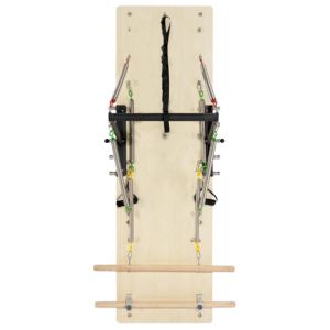 A wooden wall-mounted Pilates springboard by Faittd.