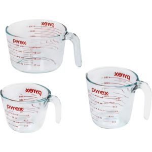 A set of three Pyrex liquid measuring cups.