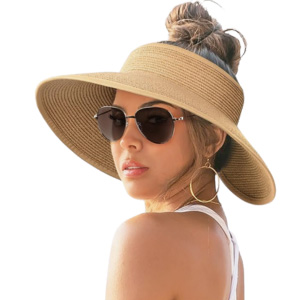 A woman wearing a wide-brim hat and sunglasses.