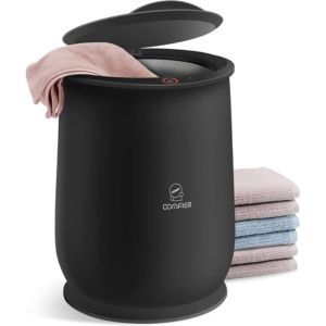 Towel Warmer Black freestanding towel warmer filled with warm hand towels for spa-like comfort at home.