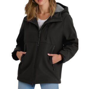 A woman wearing a black Yousify lightweight jacket.