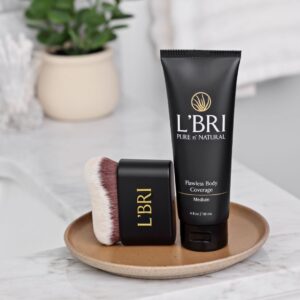 L'BRI Flawless Body Coverage on a marble bathroom counter.