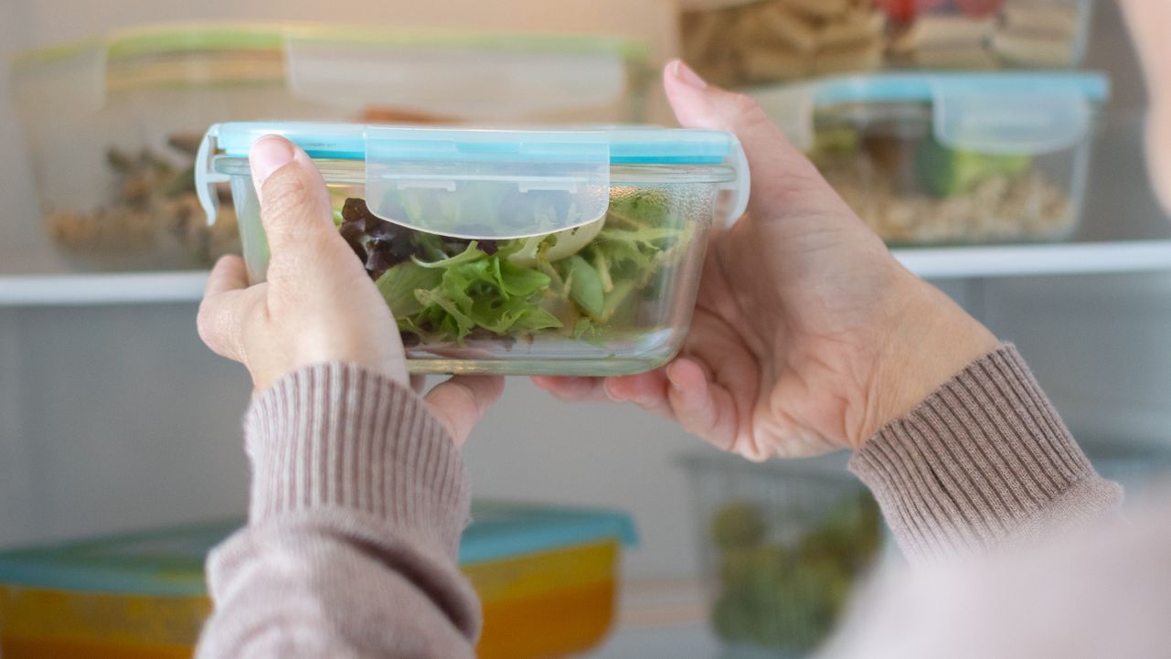 Woman doing a healthy fridge reset